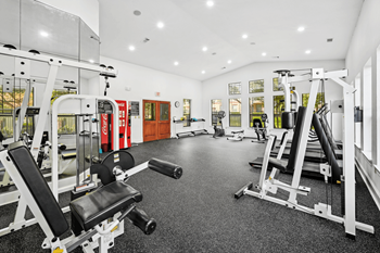 24/7 Fitness center with cardio and strength training equipment